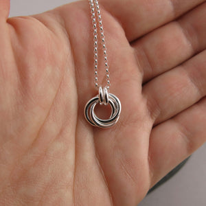 Silver love knot trio necklace by Mikel Grant Jewellery. Mini timeless love knot necklace.