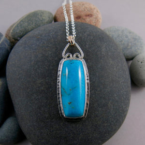 Artisan Nacozari turquoise necklace in sterling silver with 14K gold detail by Mikel Grant Jewellery.