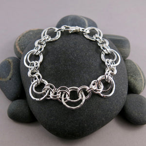 Nesting circles bracelet in sterling silver by Mikel Grant Jewellery.