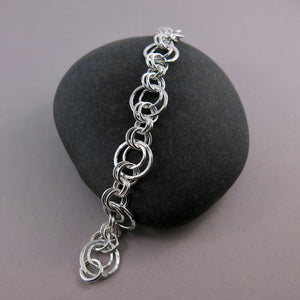 Nesting circles bracelet in sterling silver by Mikel Grant Jewellery.