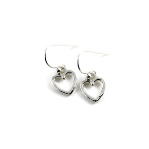 Open heart dangle earrings in sterling silver by Mikel Grant Jewellery. Artisan made hammer textured dangles.