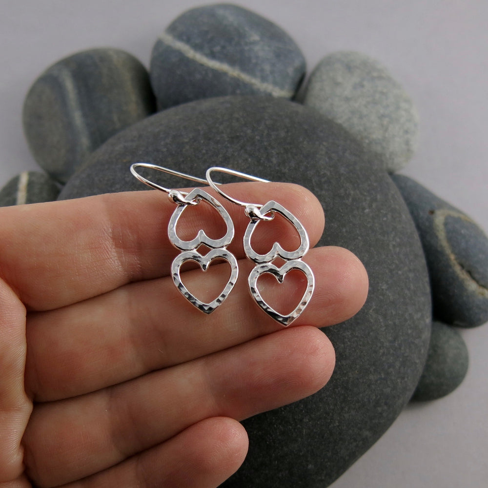Open hearts duo earrings by Mikel Grant Jewellery.  Two textured silver open hearts joined together.
