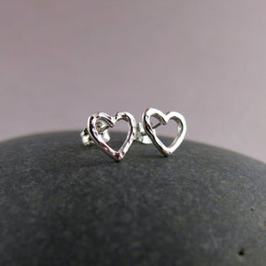 Open heart stud earrings by Mikel Grant Jewellery. Artisan made hammer textured silver everyday studs.