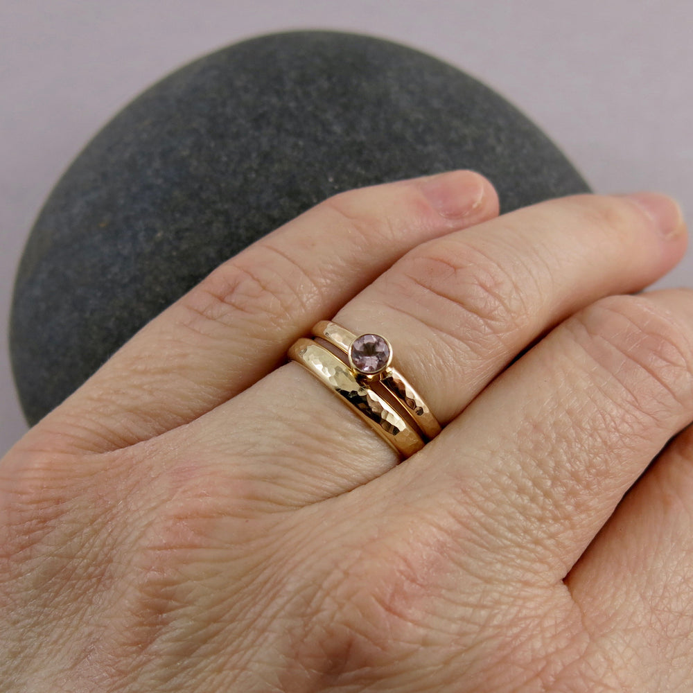 14K gold and pink morganite ring with coordinating wider hammer textured 14K gold band by Mikel Grant Jewellery. Alternative wedding ring set.