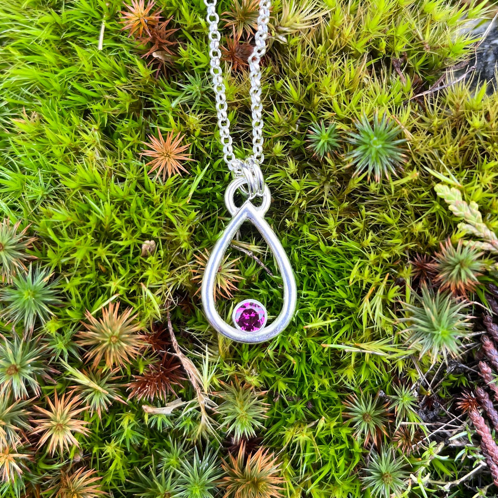 Rhodolite garnet raindrop necklace by Mikel Grant Jewellery. Viva Magenta Jewellery Collection.