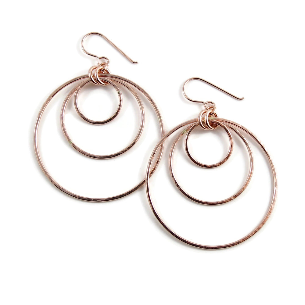 Rose gold triple nesting circle earrings by Mikel Grant Jewellery.