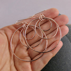 Rose gold triple nesting circle earrings by Mikel Grant Jewellery.