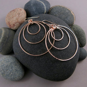 Rose gold triple nesting circle earrings by Mikel Grant Jewellery.