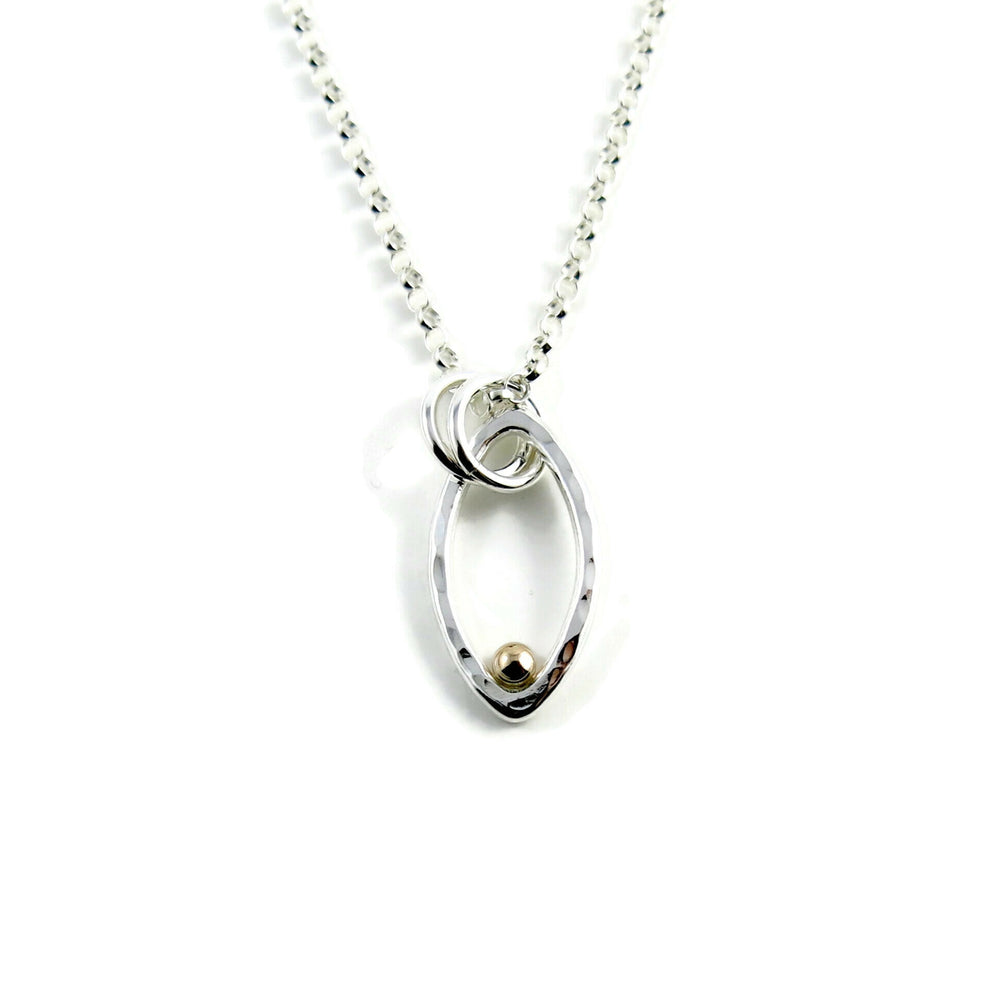 Modern minimalist sterling silver leaf necklace with gold dewdrop by Mikel Grant Jewellery.