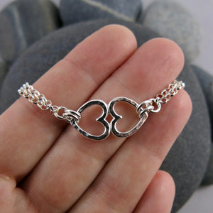 Silver open hearts duo bracelet by Mikel Grant Jewellery.