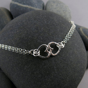 Silver open hearts duo bracelet by Mikel Grant Jewellery.