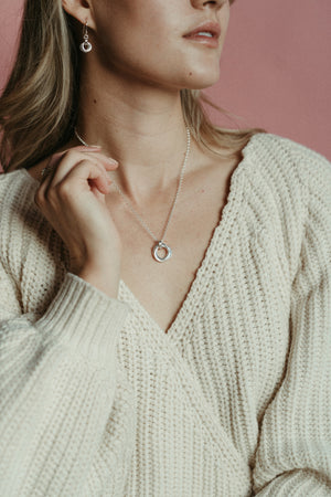 Silver love knot trio necklace by Mikel Grant Jewellery. Artisan made timeless love knot trio necklace.