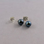 Simple black freshwater pearl studs in sterling silver by Mikel Grant Jewellery.