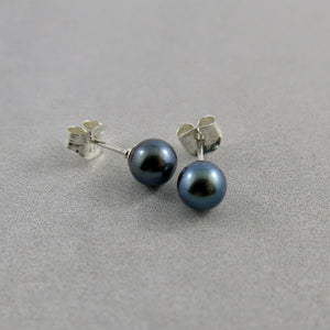 Simple black freshwater pearl studs in sterling silver by Mikel Grant Jewellery.