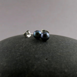 Simple black freshwater pearl studs in sterling silver by Mikel Grant Jewellery.