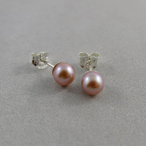 Simple pink pearl studs in sterling silver by Mikel Grant Jewellery.