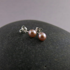 Simple pink pearl studs in sterling silver by Mikel Grant Jewellery.