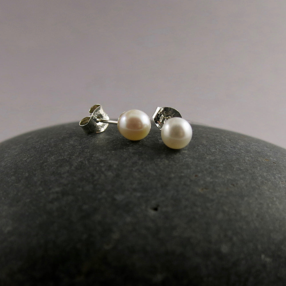 Simple white pearl studs in sterling silver by Mikel Grant Jewellery.