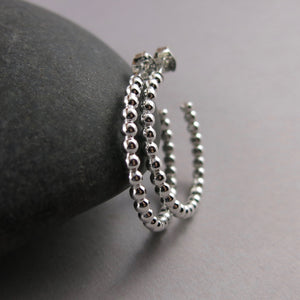 Beaded sterling silver open hoop studs by Mikel Grant Jewellery. Artisan made on the Sunshine Coast of BC.
