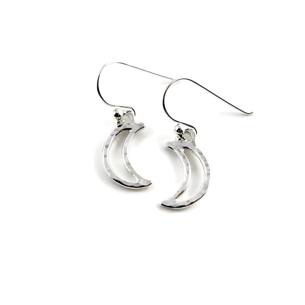 Handcrafted sterling silver hammer textured crescent moon dangle earrings by MIkel Grant Jewellery.