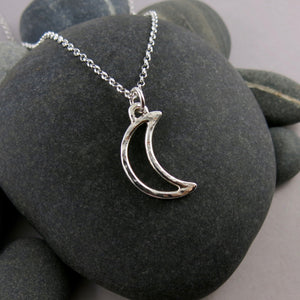 Handcrafted sterling silver crescent moon necklace by Mikel Grant Jewellery.