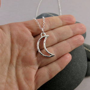 Handcrafted sterling silver crescent moon necklace by Mikel Grant Jewellery.