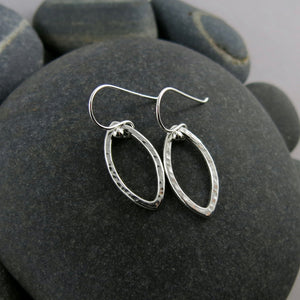 Modern minimalist sterling silver leaf earrings by Mikel Grant Jewellery.