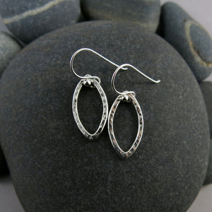 Modern minimalist sterling silver leaf earrings by Mikel Grant Jewellery.