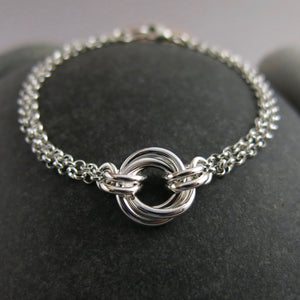 Silver love knot trio bracelet by Mikel Grant Jewellery. Timeless love knot bracelet.