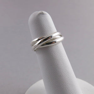 Timeless love knot trio ring in sterling silver by Mikel Grant Jewellery. Also known as Trinity rings, Rolling rings and Russian wedding rings.