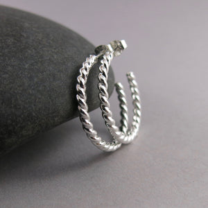 Twisted sterling silver open hoop studs by Mikel Grant Jewellery. Modern, comfortable, artisan made.