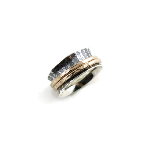 Sterling silver meditation ring with oxidized striped pattern and two hammer textured 14K gold filled spinning bands. By Mikel Grant Jewellery.