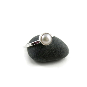 Pearl stacking ring by Mikel Grant Jewellery. White freshwater button pearl on a sterling silver band.