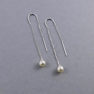 White pearl threader earrings with diamond cut cable chain by Mikel Grant Jewellery.