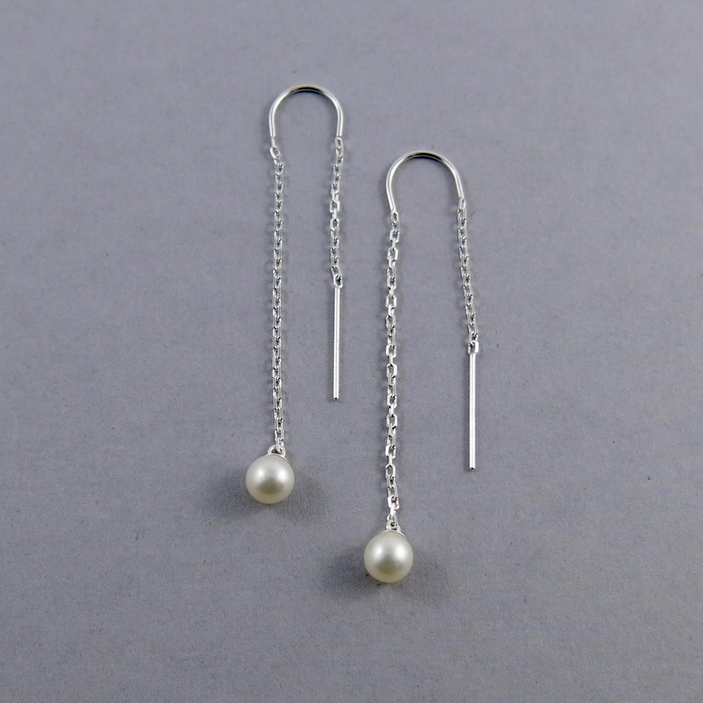White pearl threader earrings with diamond cut cable chain by Mikel Grant Jewellery.