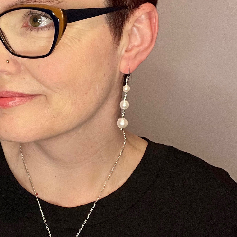 White pearl trio drop earrings in sterling silver by Mikel Grant Jewellery.