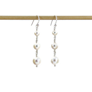 White pearl trio drop earrings in sterling silver by Mikel Grant Jewellery.