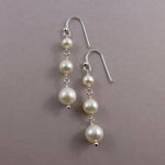 White pearl trio drop earrings in sterling silver by Mikel Grant Jewellery.