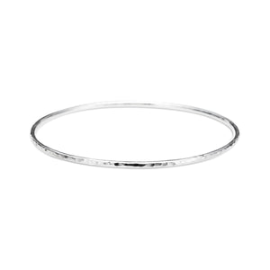 Silver hammer textured bangle by Mikel Grant Jewellery. Artisan made sterling silver bangle.