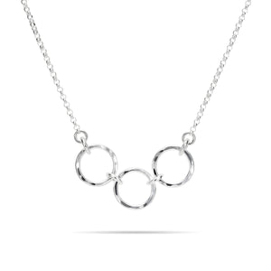 Silver open circles trio necklace by Mikel Grant Jewellery. Hammer textured breathe trio necklace.