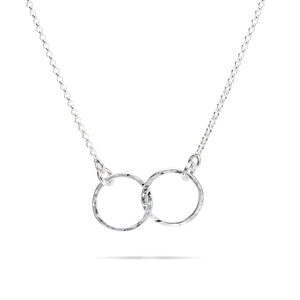 Embrace necklace by Mikel Grant Jewellery. Interlocking hammer textured silver circles.