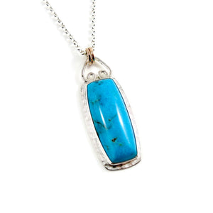 Artisan Nacozari turquoise necklace in sterling silver with 14K gold detail by Mikel Grant Jewellery.