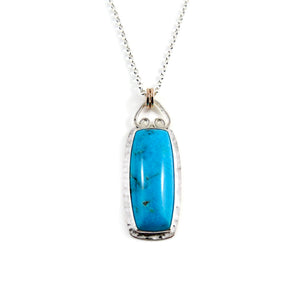 Artisan Nacozari turquoise necklace in sterling silver with 14K gold detail by Mikel Grant Jewellery.