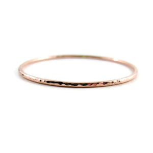 Rose gold bangle by Mikel Grant Jewellery. Artisan made hammer textured 14K rose gold filled bangle.